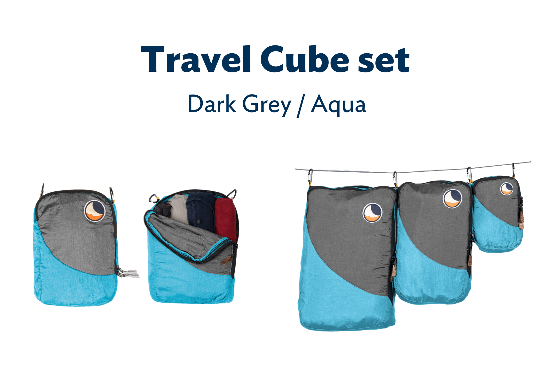 Travel Cube Set in Dunkelgrau und Aqua – drei praktische Packwürfel in verschiedenen Größen, einer geöffnet mit Kleidung befüllt.